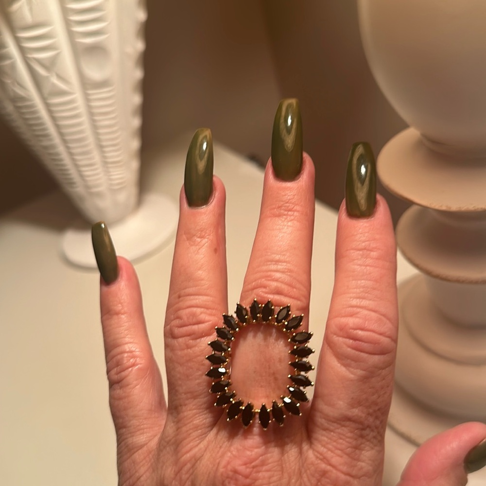 Cocktail ring gold tone with black stones